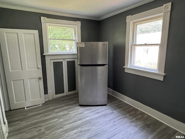 305 E Republic St, Peoria, IL 61603 - kitchen with freestanding refrigerator, ornamental molding, wood finished floors, and baseboards