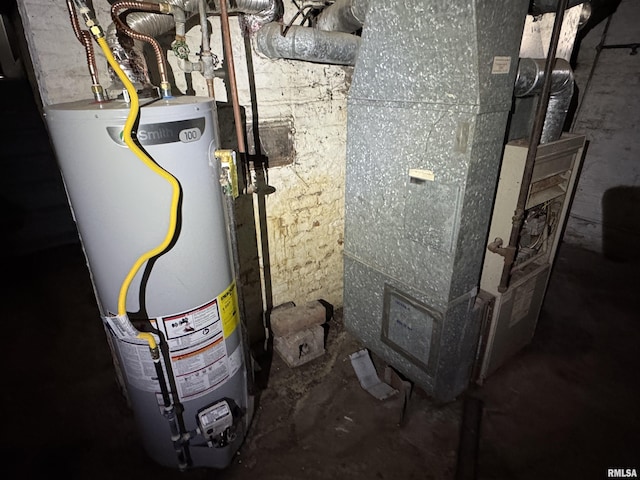 305 E Republic St, Peoria, IL 61603 - utility room with gas water heater and heating unit