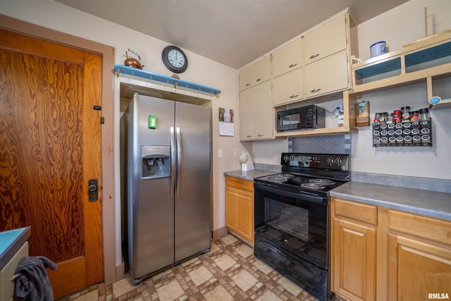 602 W Adams St, Abingdon, IL 61410 - kitchen featuring black appliances, open shelves, and light flooring