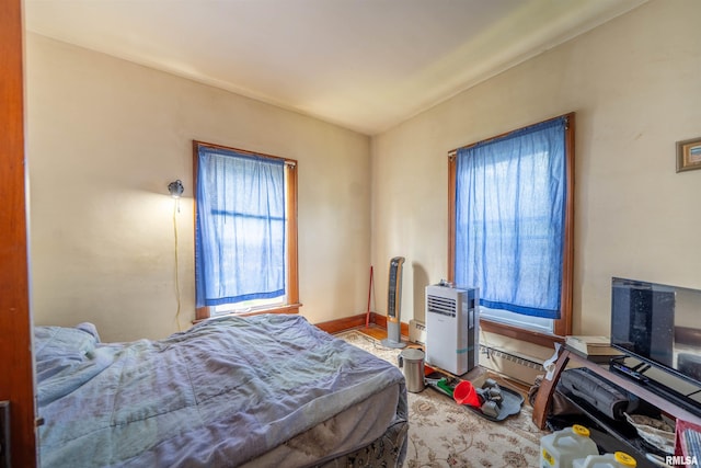 602 W Adams St, Abingdon, IL 61410 - bedroom with a baseboard radiator and baseboards