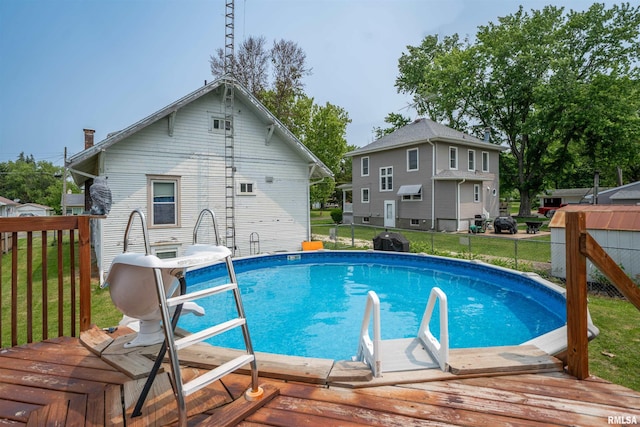 602 W Adams St, Abingdon, IL 61410 - view of swimming pool featuring a wooden deck and area for grilling
