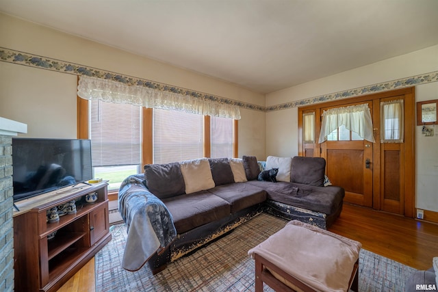 602 W Adams St, Abingdon, IL 61410 - living room with wood finished floors and a fireplace