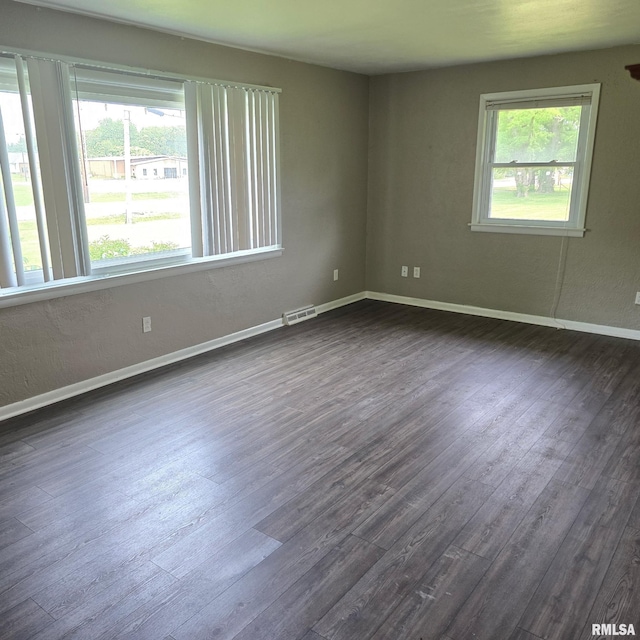 4928 W Farmington Rd, Peoria, IL 61604 - unfurnished room featuring dark wood finished floors and baseboards