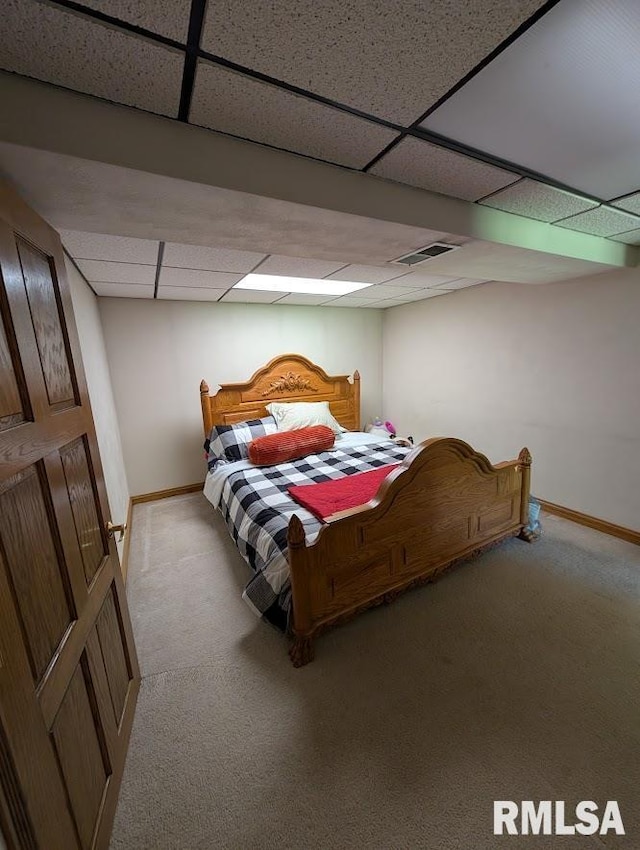 2123 Highwood Ave, Pekin, IL 61554 - bedroom featuring a paneled ceiling, light colored carpet, and baseboards