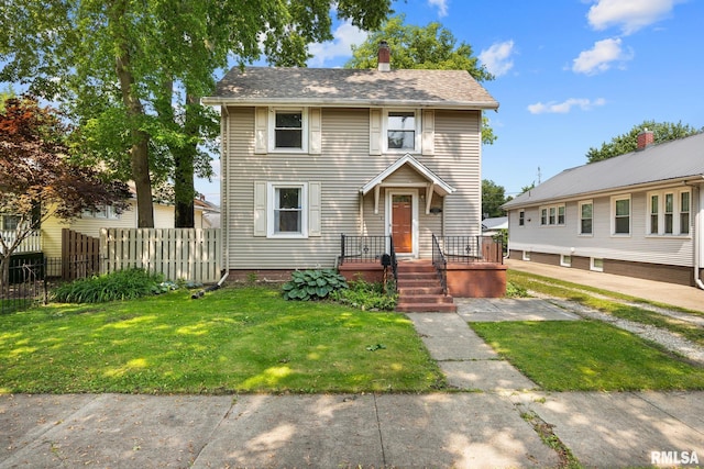 1111 S 4th St, Pekin, IL 61554 - view of front facade with a chimney