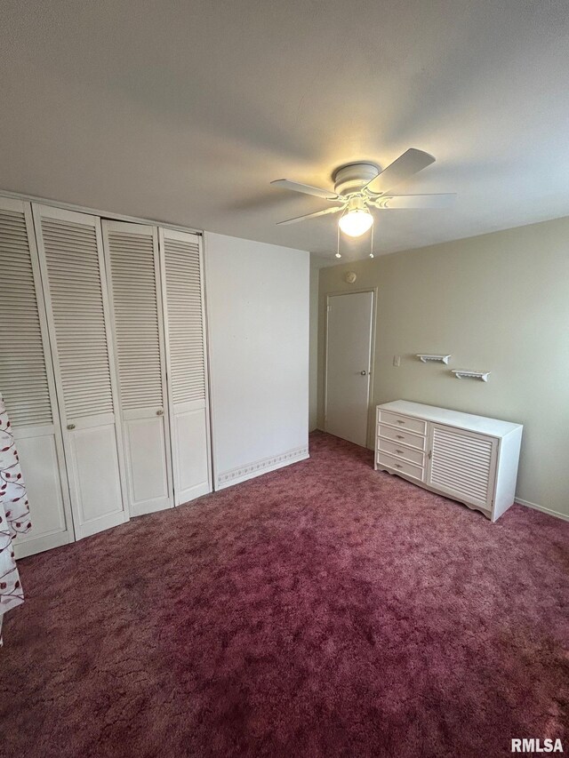 1407 Lincoln St, Pekin, IL 61554 - unfurnished bedroom featuring carpet floors, a closet, and ceiling fan
