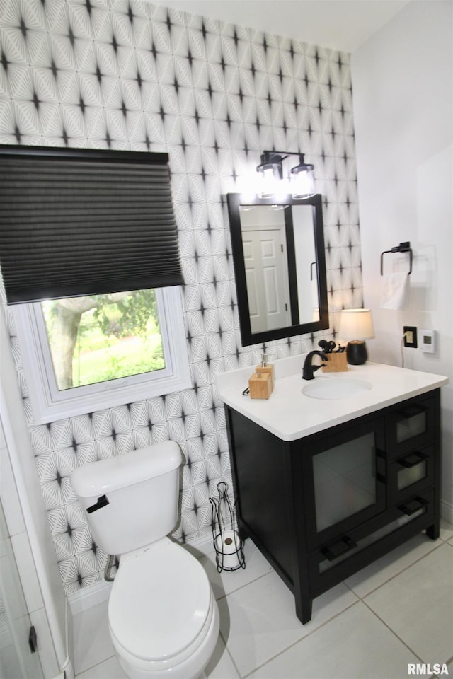 1964 Chestnut Ln, Washington, IL 61571 - half bathroom with vanity and tile patterned flooring