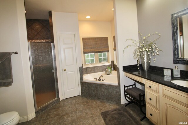 1964 Chestnut Ln, Washington, IL 61571 - bathroom featuring vanity, a bath, a shower stall, and recessed lighting
