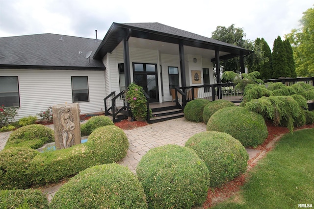 1964 Chestnut Ln, Washington, IL 61571 - rear view of house featuring a shingled roof and a porch
