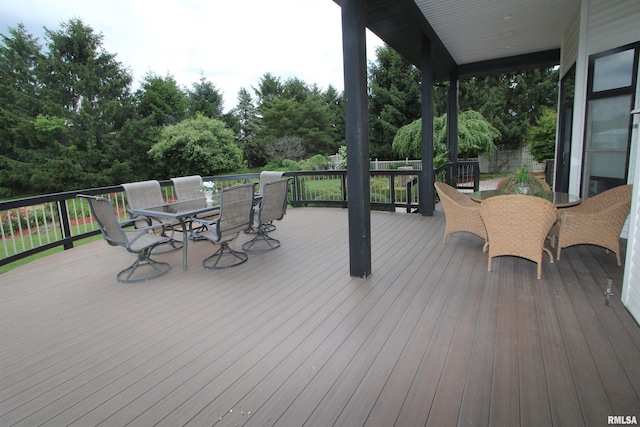 1964 Chestnut Ln, Washington, IL 61571 - wooden deck featuring outdoor dining space and view of wooded area