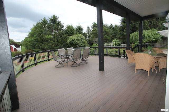 1964 Chestnut Ln, Washington, IL 61571 - deck featuring outdoor dining space and view of scattered trees