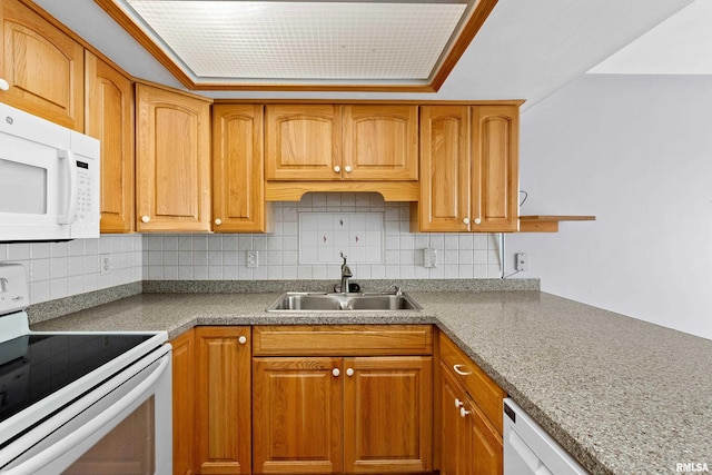 1461 Valle Vista Blvd Unit 30, Pekin, IL 61554 - kitchen featuring white appliances, a sink, backsplash, and brown cabinets