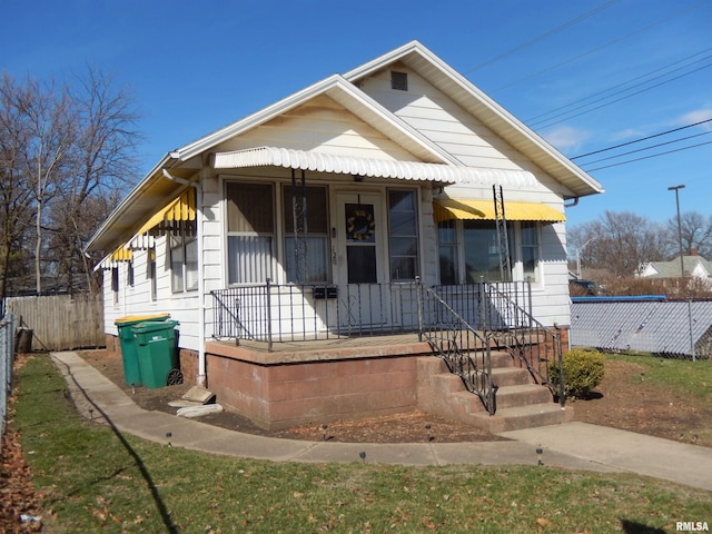 120 W Adams St, Macomb, IL 61455 - view of front of home featuring a porch