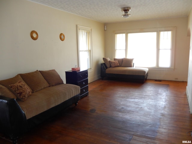 120 W Adams St, Macomb, IL 61455 - living room featuring wood finished floors