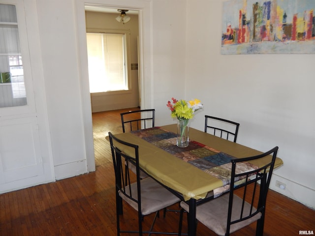 120 W Adams St, Macomb, IL 61455 - dining area featuring hardwood / wood-style floors