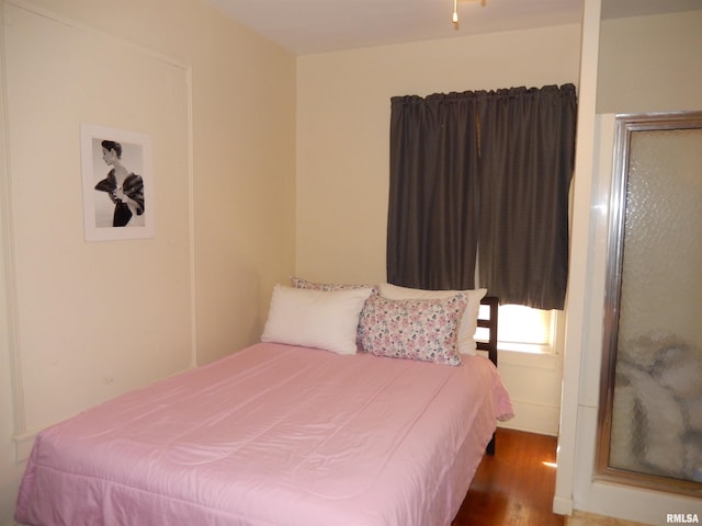 120 W Adams St, Macomb, IL 61455 - bedroom featuring wood finished floors