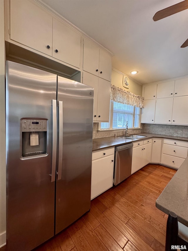 360 N Normal St, Macomb, IL 61455 - kitchen featuring stainless steel appliances, hardwood / wood-style floors, ceiling fan, white cabinets, and recessed lighting