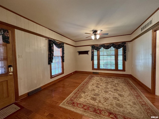360 N Normal St, Macomb, IL 61455 - foyer featuring wood finished floors, ornamental molding, and a ceiling fan