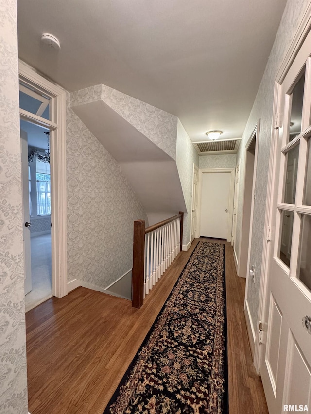 360 N Normal St, Macomb, IL 61455 - hallway with wood finished floors and wallpapered walls