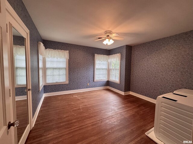 360 N Normal St, Macomb, IL 61455 - unfurnished room featuring dark wood finished floors and a ceiling fan
