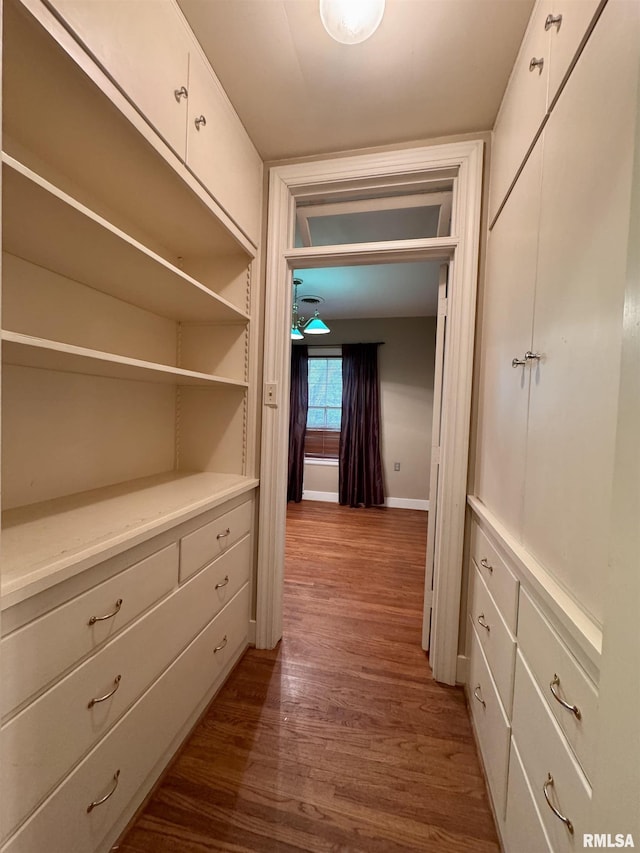360 N Normal St, Macomb, IL 61455 - hallway featuring dark wood finished floors and baseboards