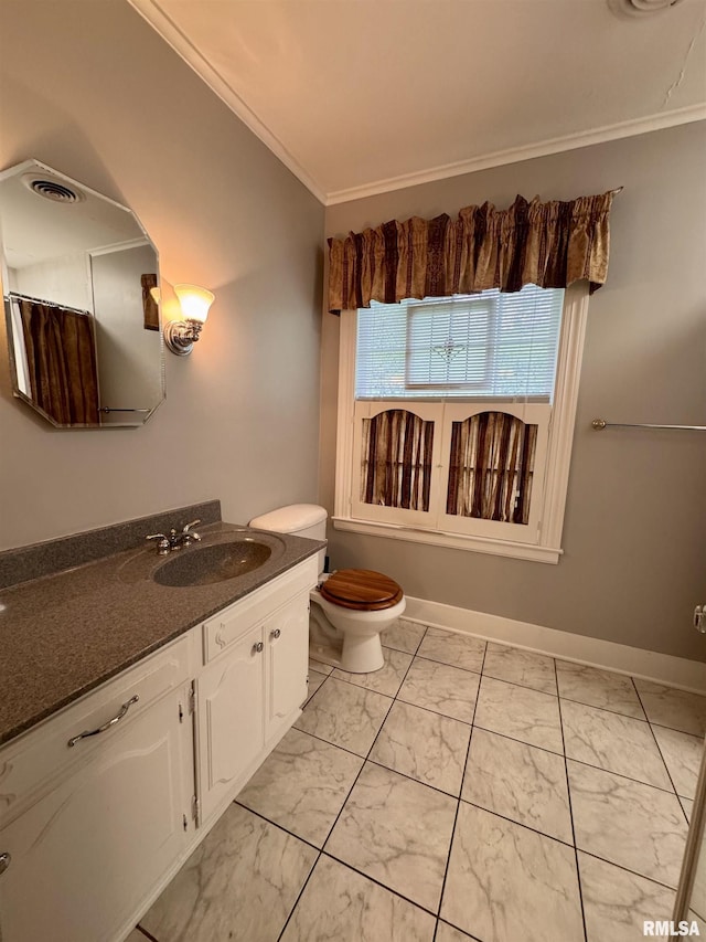 360 N Normal St, Macomb, IL 61455 - bathroom featuring marble look tile flooring, crown molding, and vanity