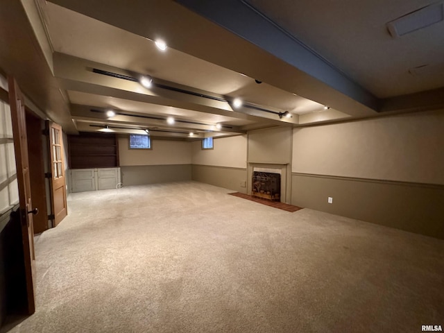 360 N Normal St, Macomb, IL 61455 - finished below grade area with carpet flooring and a fireplace with flush hearth