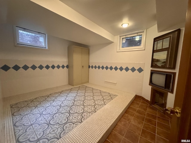 360 N Normal St, Macomb, IL 61455 - finished below grade area with tile walls and dark tile patterned floors
