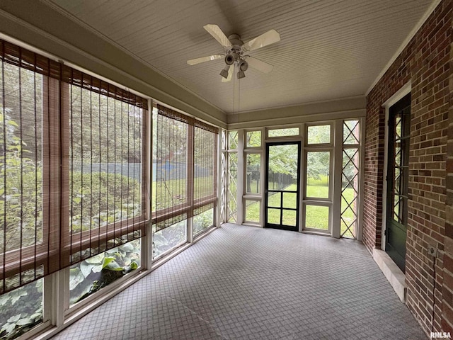 360 N Normal St, Macomb, IL 61455 - unfurnished sunroom with a ceiling fan and plenty of natural light