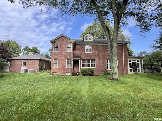 360 N Normal St, Macomb, IL 61455 - rear view of house featuring a chimney and brick siding