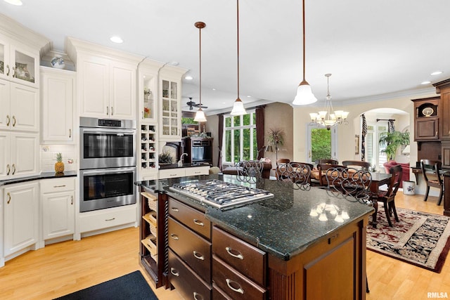 11518 N Nettle Creek Dr, Dunlap, IL 61525 - kitchen with stainless steel appliances, light wood-style flooring, a chandelier, white cabinets, and recessed lighting