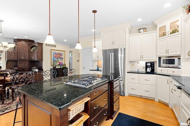 11518 N Nettle Creek Dr, Dunlap, IL 61525 - kitchen featuring stainless steel appliances, ornamental molding, light wood-type flooring, white cabinets, and recessed lighting