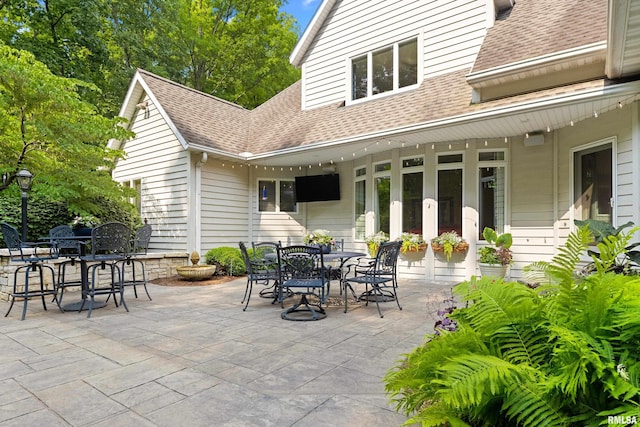 11518 N Nettle Creek Dr, Dunlap, IL 61525 - view of patio / terrace featuring outdoor dining area