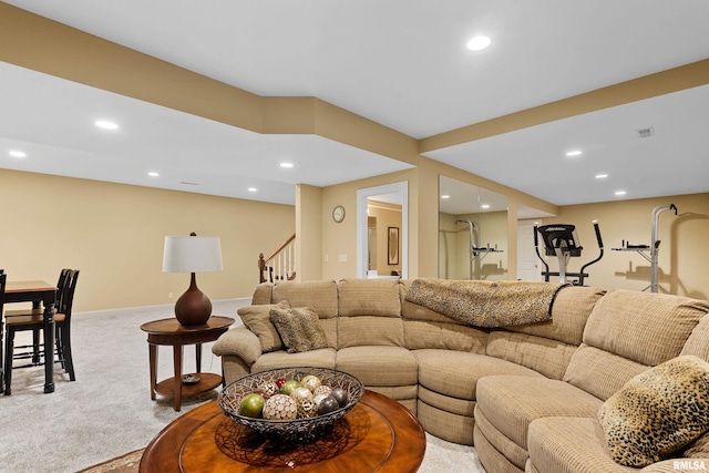 11518 N Nettle Creek Dr, Dunlap, IL 61525 - living room featuring light colored carpet, stairs, and recessed lighting