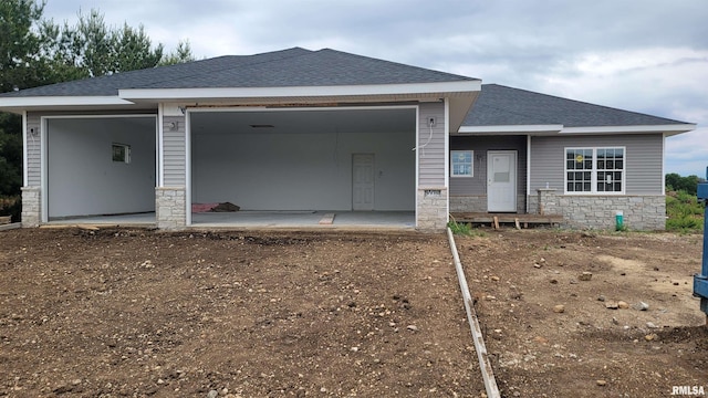 1304 W Hillcrest Dr, Chillicothe, IL 61523 - ranch-style house with stone siding and roof with shingles