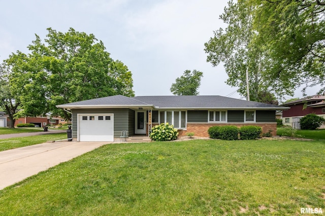 4415 N Rosemead Dr, Peoria, IL 61614 - single story home featuring a garage, driveway, a front yard, and brick siding