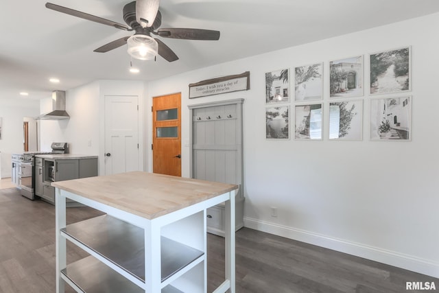 4415 N Rosemead Dr, Peoria, IL 61614 - kitchen with wall chimney exhaust hood, stainless steel gas range, dark wood-style flooring, recessed lighting, and ceiling fan