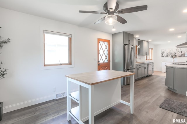 4415 N Rosemead Dr, Peoria, IL 61614 - kitchen featuring gray cabinetry, stainless steel appliances, a ceiling fan, dark wood finished floors, and recessed lighting