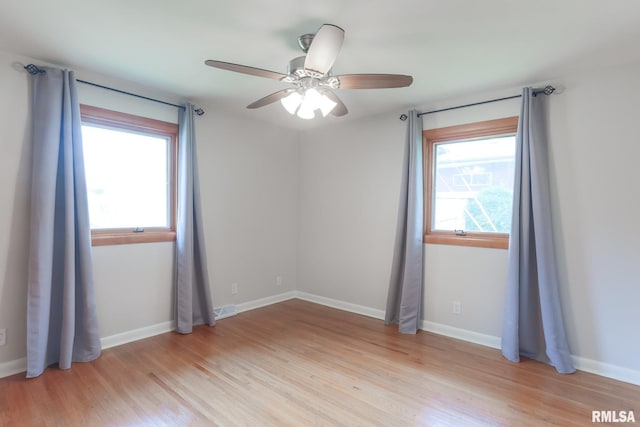 4415 N Rosemead Dr, Peoria, IL 61614 - empty room with light wood-style floors and ceiling fan