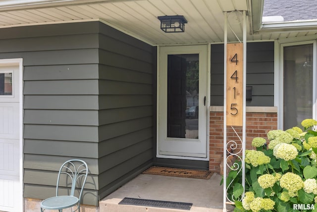 4415 N Rosemead Dr, Peoria, IL 61614 - entrance to property featuring brick siding