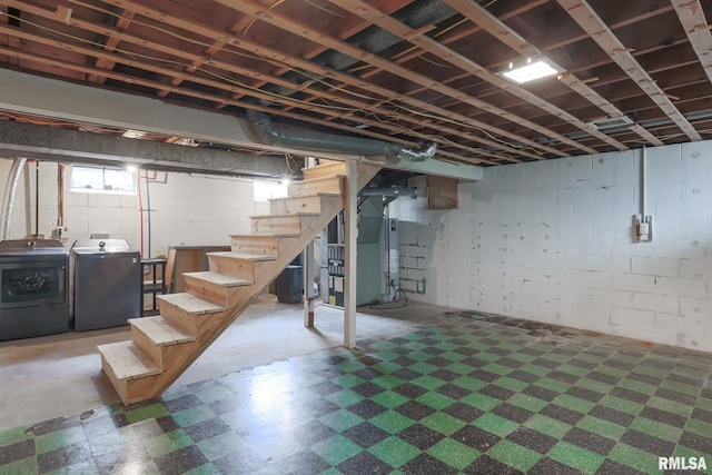 4415 N Rosemead Dr, Peoria, IL 61614 - below grade area featuring washing machine and dryer, tile patterned floors, stairs, water heater, and heating unit