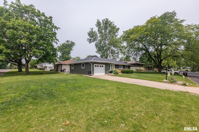 4415 N Rosemead Dr, Peoria, IL 61614 - single story home featuring a garage, driveway, and a front yard