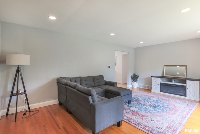 4415 N Rosemead Dr, Peoria, IL 61614 - living area with wood finished floors and recessed lighting