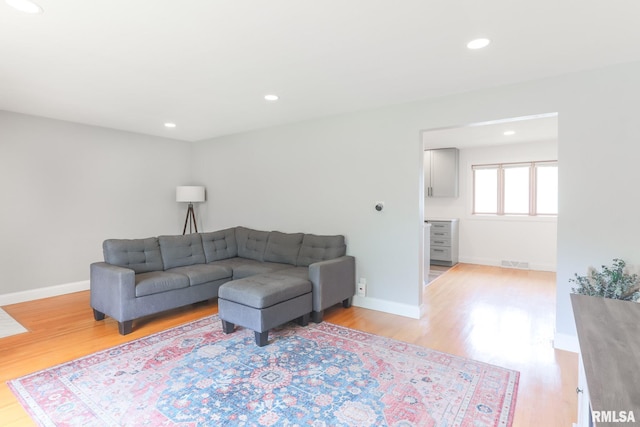 4415 N Rosemead Dr, Peoria, IL 61614 - living room with light wood finished floors and recessed lighting