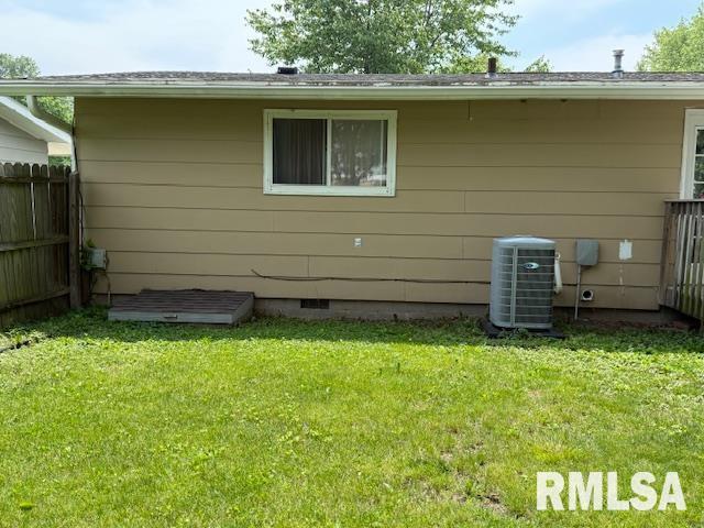 603 Sherry St, Colchester, IL 62326 - rear view of property featuring central air condition unit and crawl space