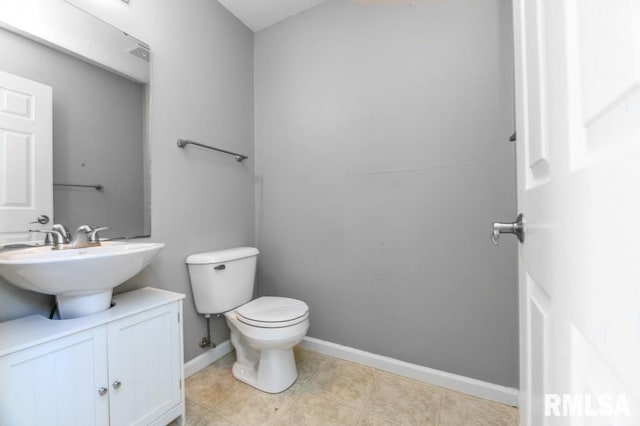 2331 W Molly Ln, Dunlap, IL 61525 - half bath with toilet, vanity, baseboards, and tile patterned flooring