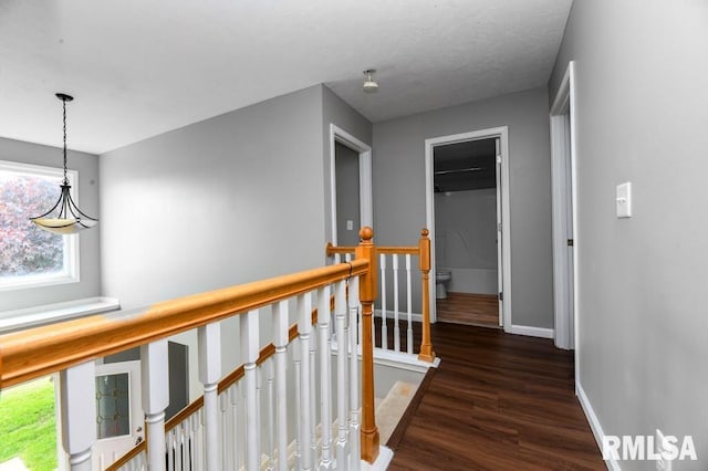 2331 W Molly Ln, Dunlap, IL 61525 - hall with dark wood-type flooring, an upstairs landing, and baseboards