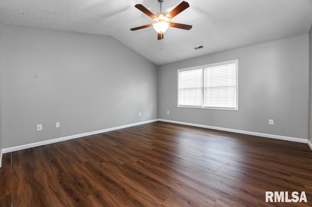 2331 W Molly Ln, Dunlap, IL 61525 - spare room featuring a ceiling fan, lofted ceiling, dark wood finished floors, and baseboards
