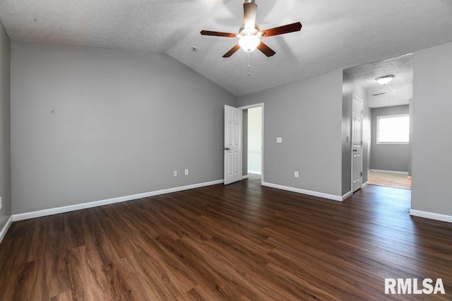 2331 W Molly Ln, Dunlap, IL 61525 - spare room featuring a ceiling fan, baseboards, dark wood finished floors, lofted ceiling, and a textured ceiling