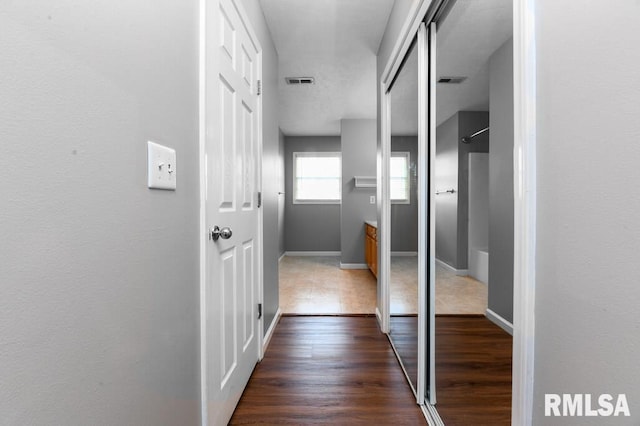2331 W Molly Ln, Dunlap, IL 61525 - hallway with baseboards and dark wood finished floors